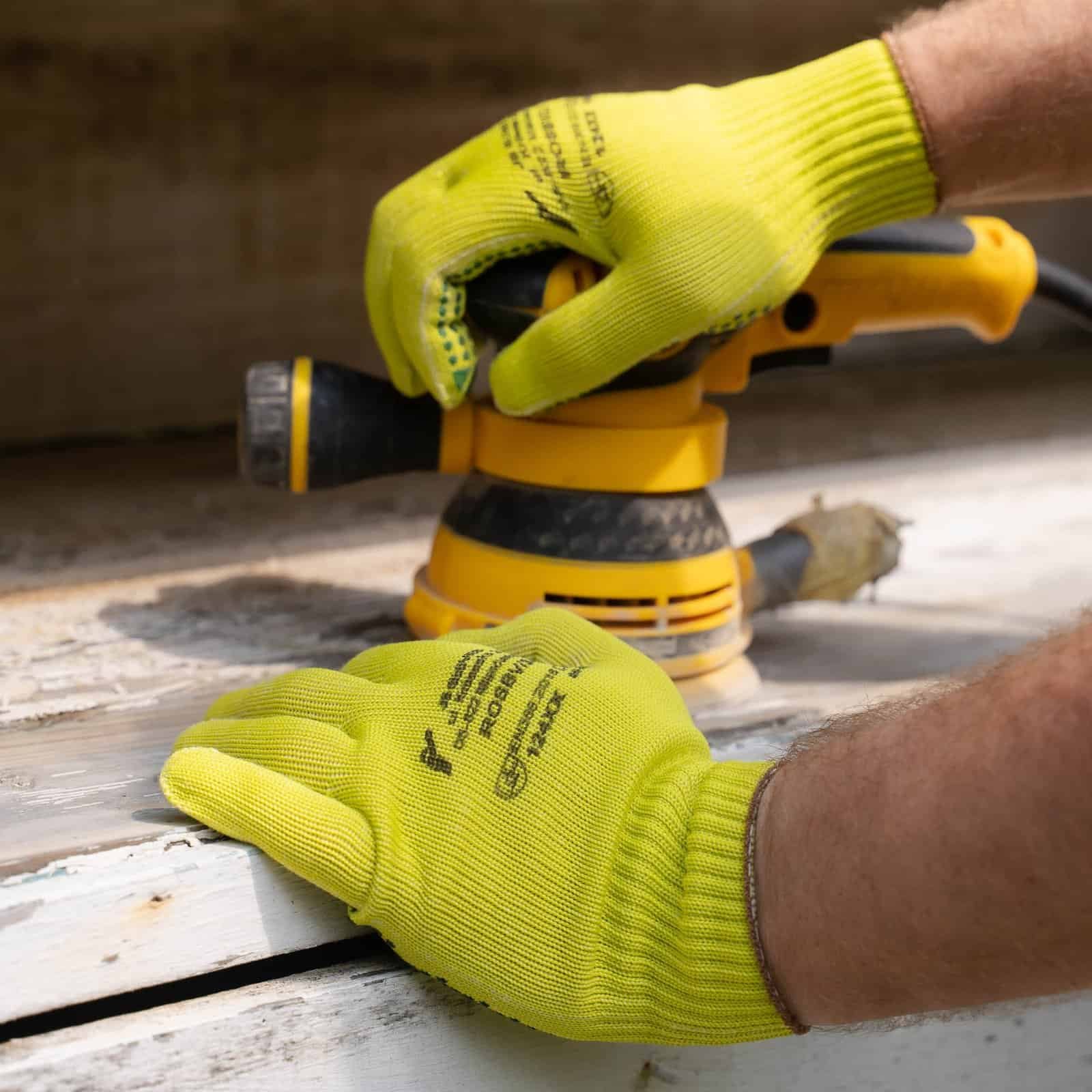 High-visible gloves at workplace