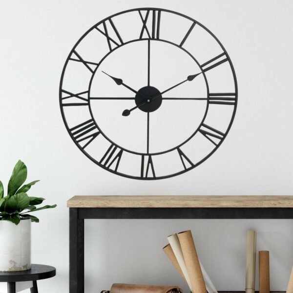 Vintage 40CM Black Metal Wall Clock – Timeless Home Decor Description: “Make a bold statement with this 40CM vintage metal wall clock. Featuring a striking open back design, metal numerals, and a distressed frame, it adds character to any room. Powered by AA battery, it’s suitable for indoor and sheltered outdoor use. Home & Garden Free Shipping 5