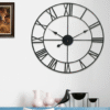 Vintage 40CM Black Metal Wall Clock – Timeless Home Decor Description: “Make a bold statement with this 40CM vintage metal wall clock. Featuring a striking open back design, metal numerals, and a distressed frame, it adds character to any room. Powered by AA battery, it’s suitable for indoor and sheltered outdoor use. Home & Garden Free Shipping 27