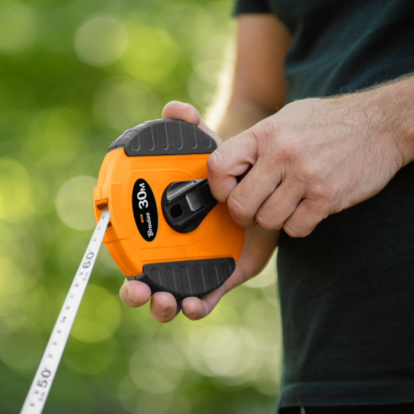 Fibreglass Coiled Tape Measure 13mm Wide Black/Orange